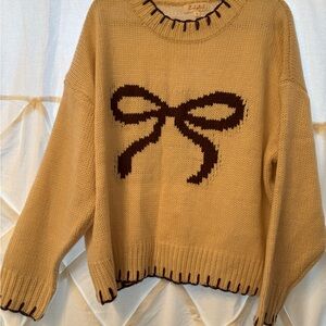 Chic Tan Sweater with Brown Bow Accent